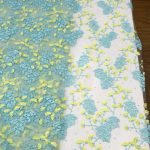 Tecidos de renda floral em tule, desenhos de flores bordados